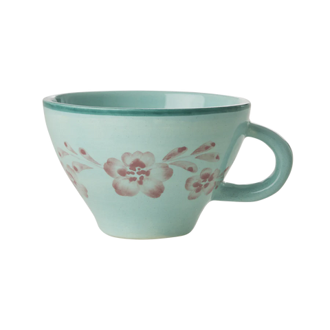 Taza de te de cerámica verde con flores rosas pintadas a mano