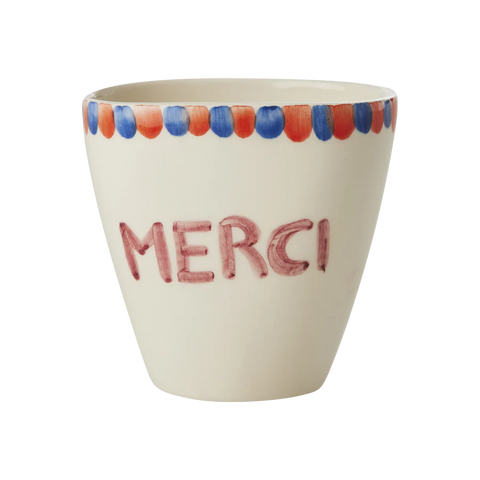 Taza ovalada de cerámica crema pintada a mano "MERCI"