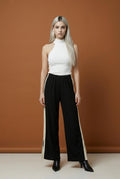 Pantalón de lino negro con beige